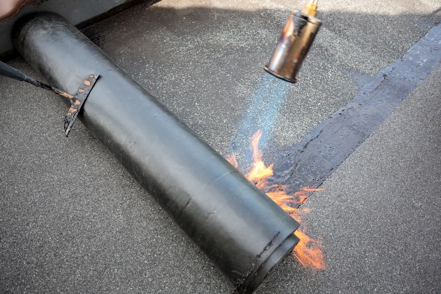 torch on flat roofing felt